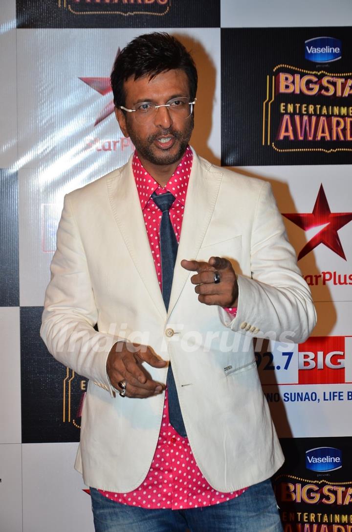 Javed Jaffrey poses for the media at Big Star Entertainment Awards 2014