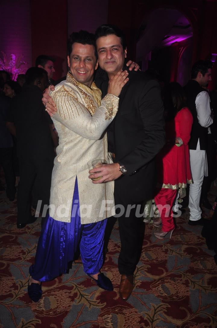 Armaan Kohli poses with a friend at Uday and Shirin's Sangeet Ceremony