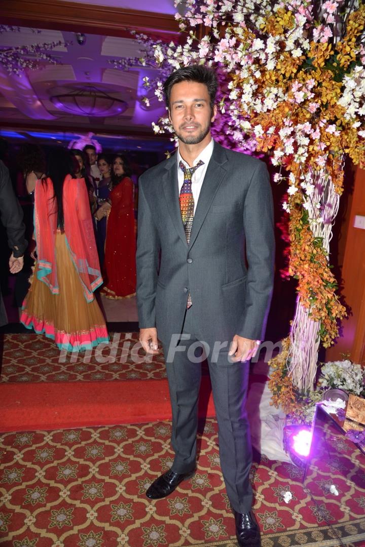 Rajneesh Duggal poses for the media at Uday and Shirin's Sangeet Ceremony