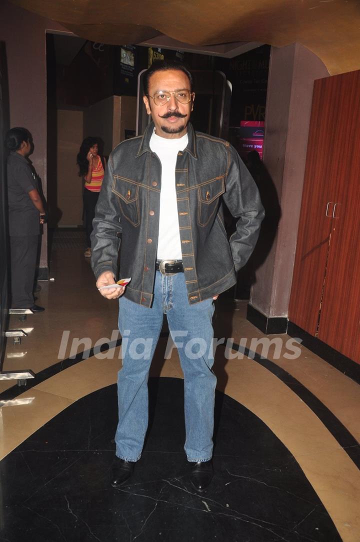 Gulshan Grover poses for the media at the Special Screening of P.K.