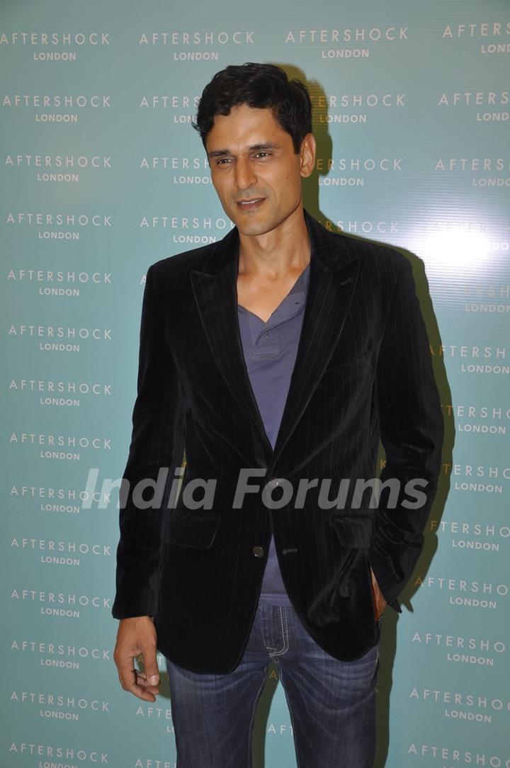 Niketan Madhok poses for the media at After Shock's Store Launch