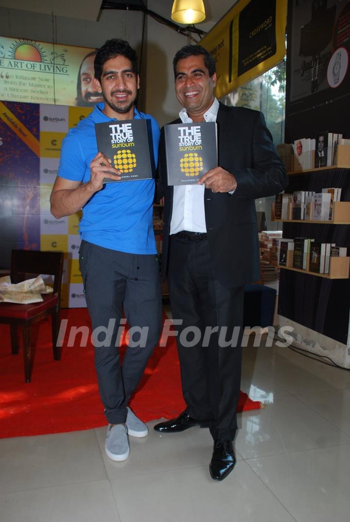 Ayan Mukerji poses with a guest at the Book Launch of 'The True Story of Sun Burn'