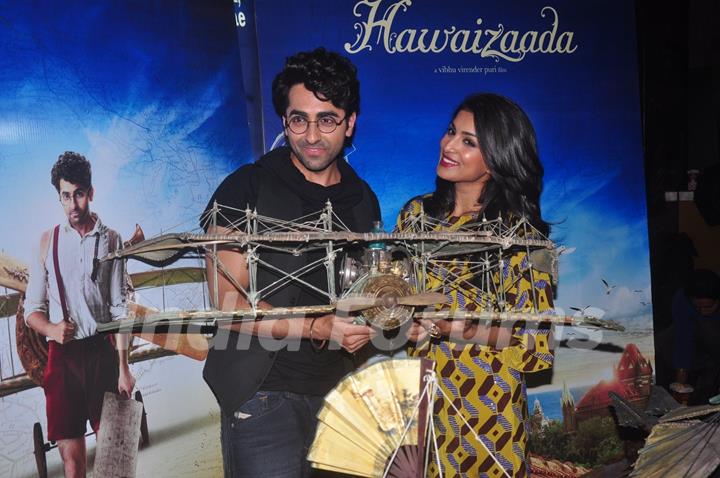 Ayushmann Khurrana and Pallavi Sharda pose with a plane at the Trailer Launch of Hawaizaada