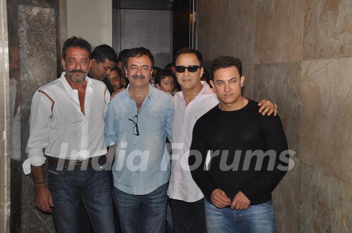 Team poses for the media at the Special Screening of P.K. for Sanjay Dutt