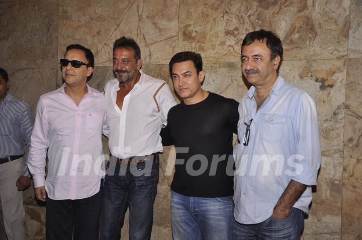 Team poses for the media at the Special Screening of P.K. for Sanjay Dutt