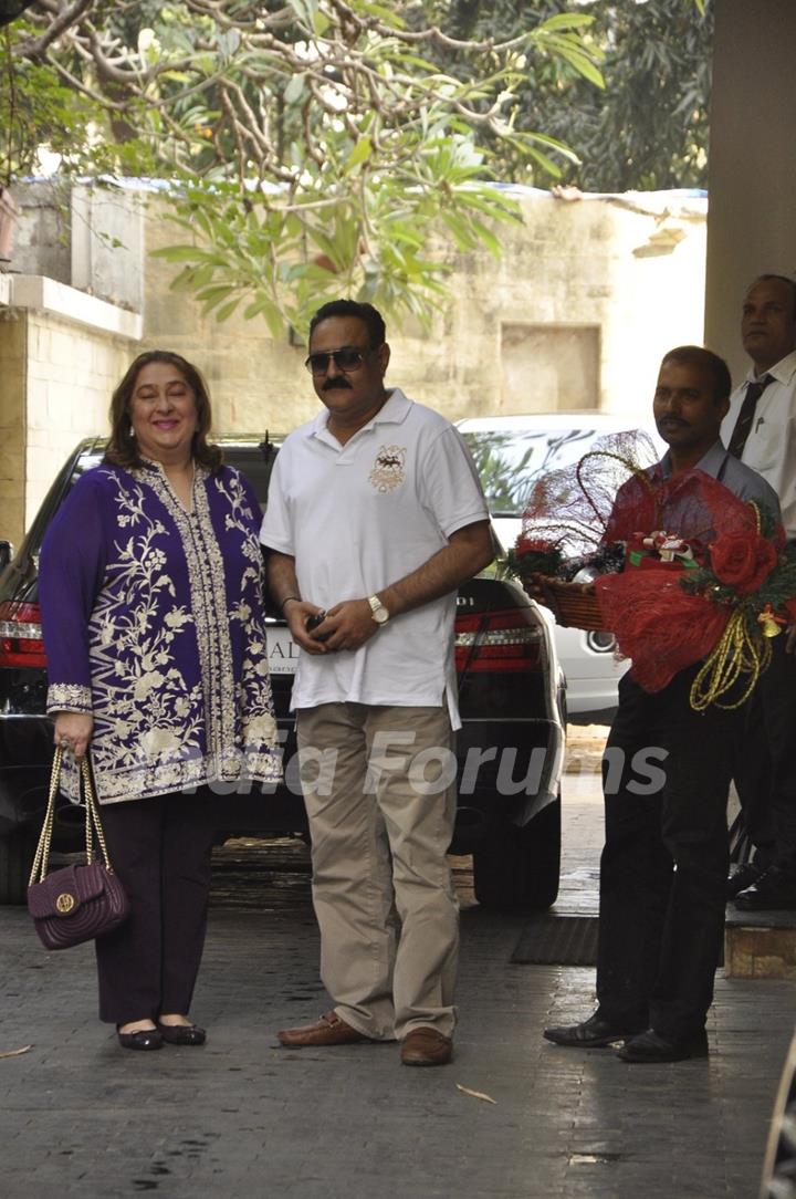 Manoj Jain and Reema Kapoor pose for the media at the Get-to-Gather for a Christmas Lunch