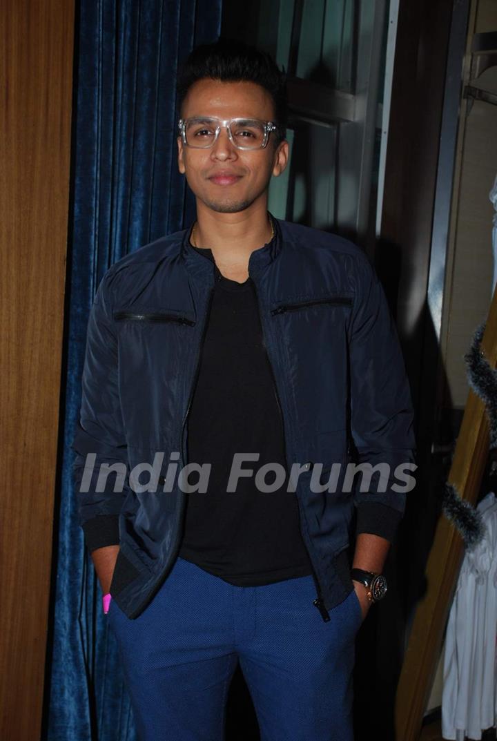 Abhijeet Sawant poses for the media at Lucky's Music Club