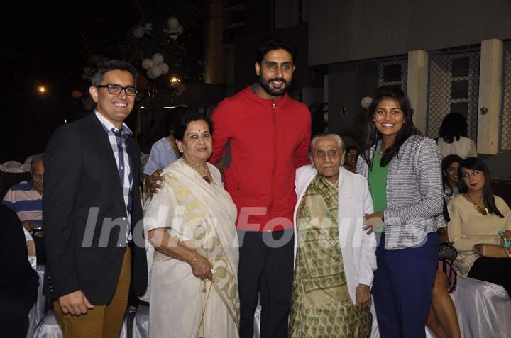 Abhishek Bachchan  poses with guests at Jamnabai Narsee School