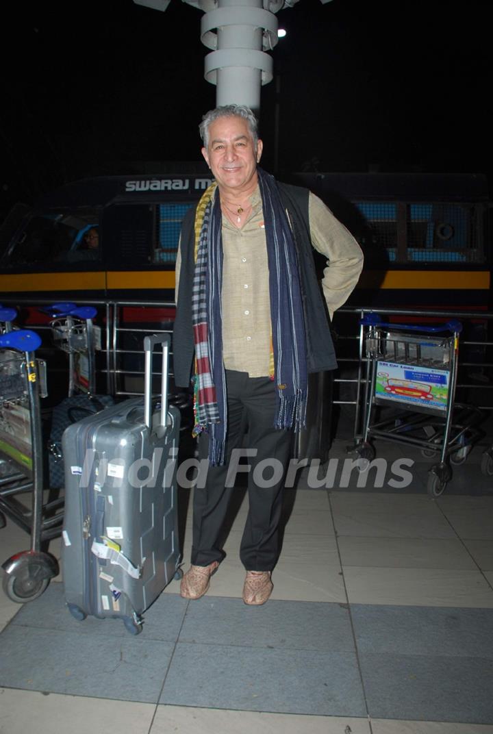Dalip Tahil poses for the media at Airport