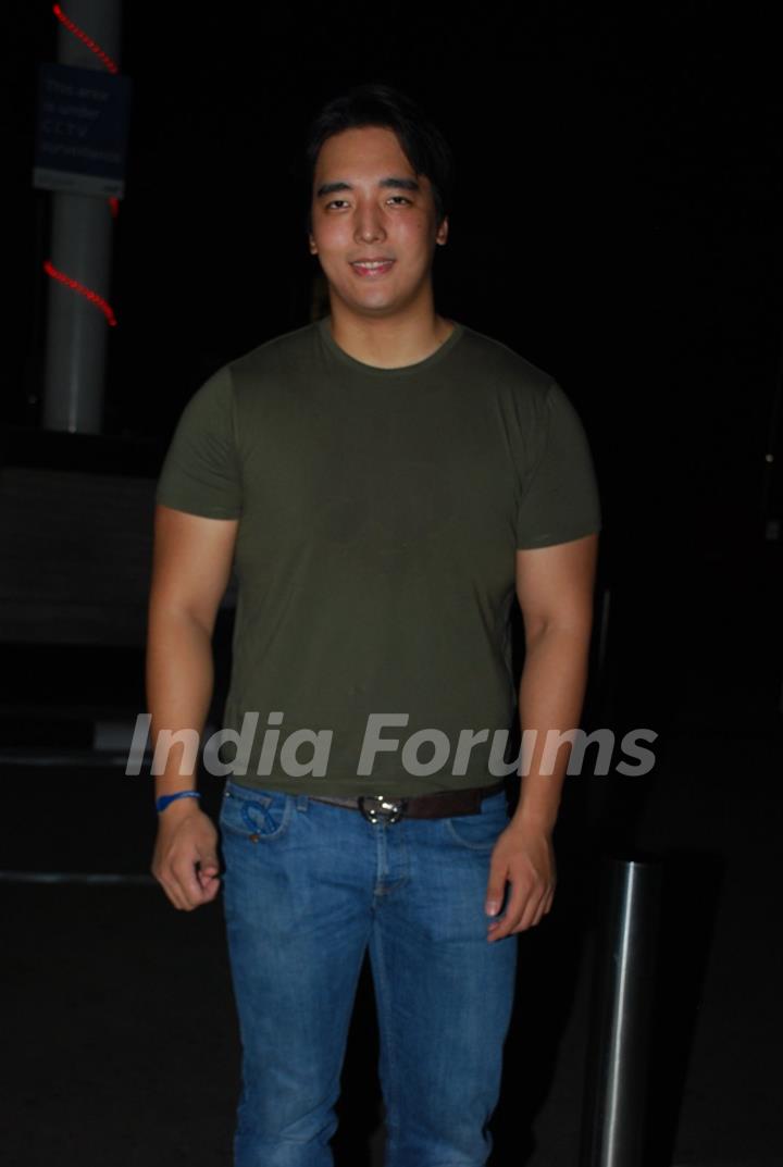 Rinzing Denzongpa poses for the media at Airport