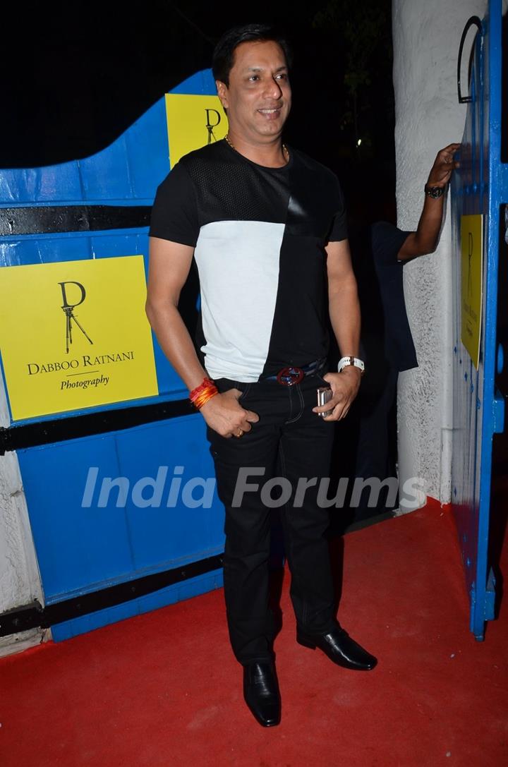 Madhur Bhandarkar poses for the media at Dabboo Ratnani's Calendar Launch