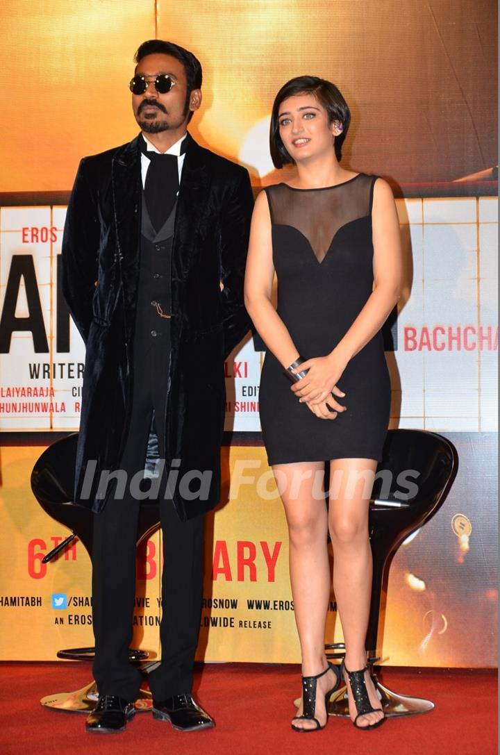 Dhanush and Akshara Haasan pose for the media at the Trailer Launch of Shamitabh