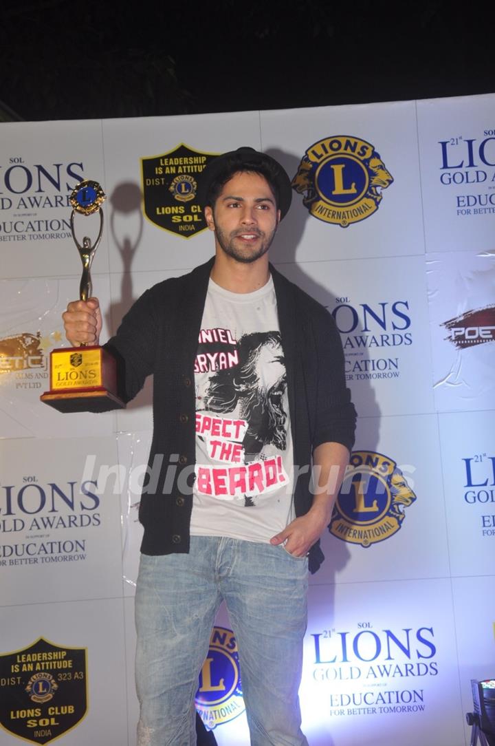 Varun Dhawan poses with his award at Lion Gold Awards