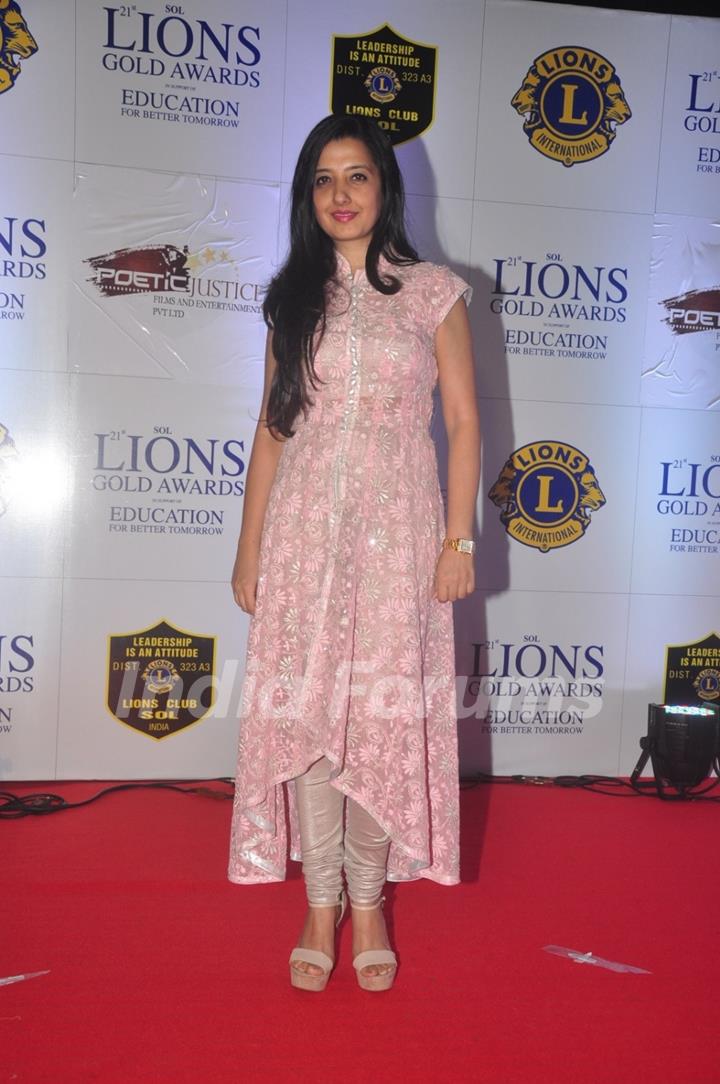 Amy Billimoria poses for the media at Lion Gold Awards