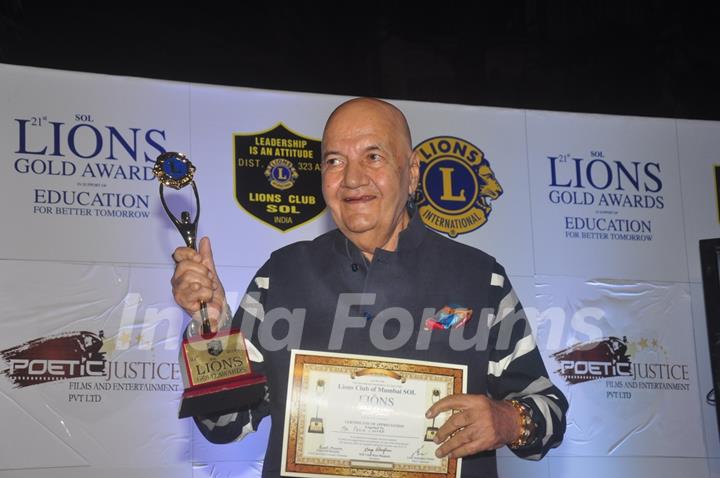Prem Chopra poses with his award at Lion Gold Awards