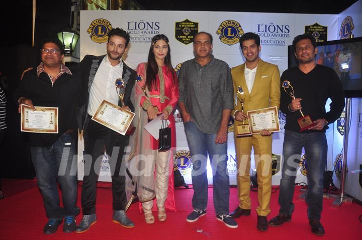Team of EVEREST poses for the media at Lion Gold Awards