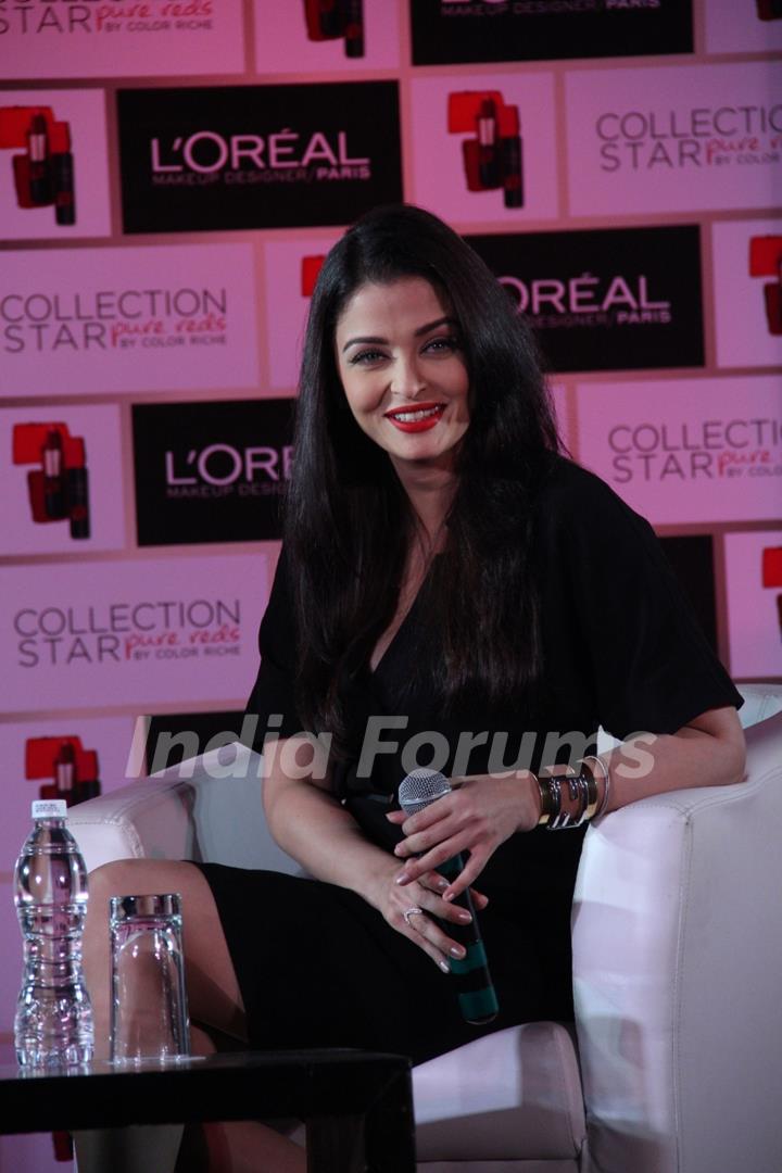 Aishwarya Rai Bachchan smiles for the camera at the Launch of L'Oreal Paris Moist Matte Collection