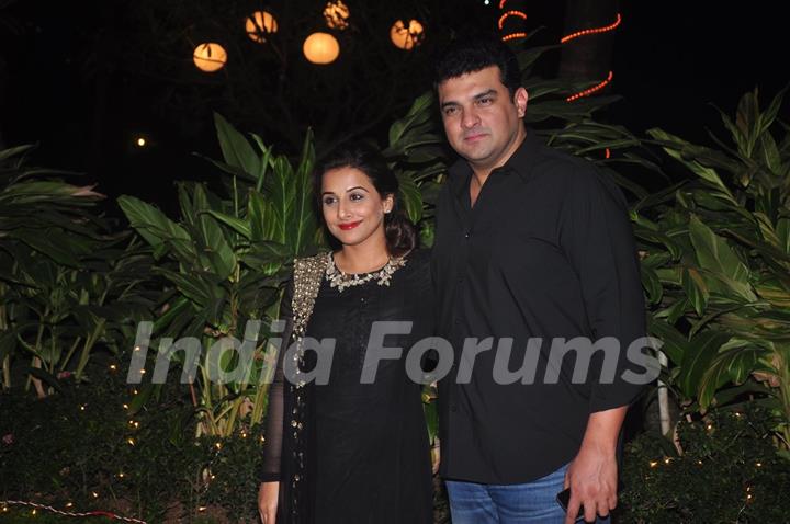 Siddharth Roy Kapoor and Vidya Balan pose for the media at Farah Khan's Birthday Bash