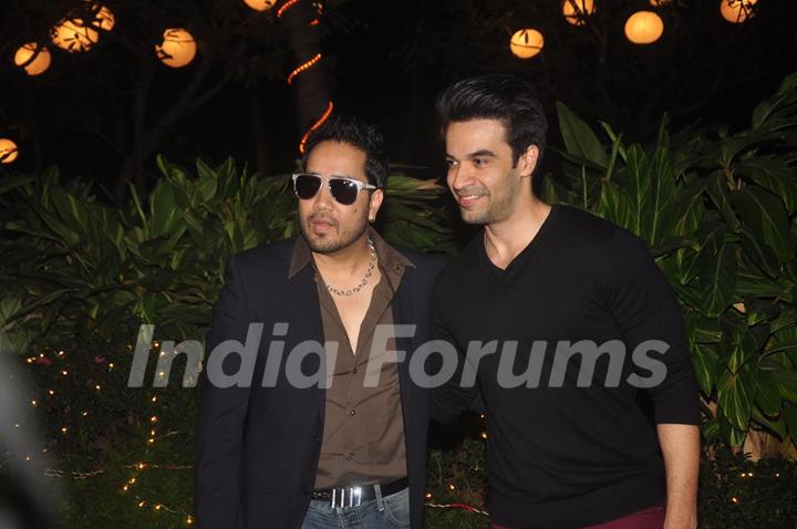 Mika Singh and Punit Malhotra pose for the media at Farah Khan's Birthday Bash