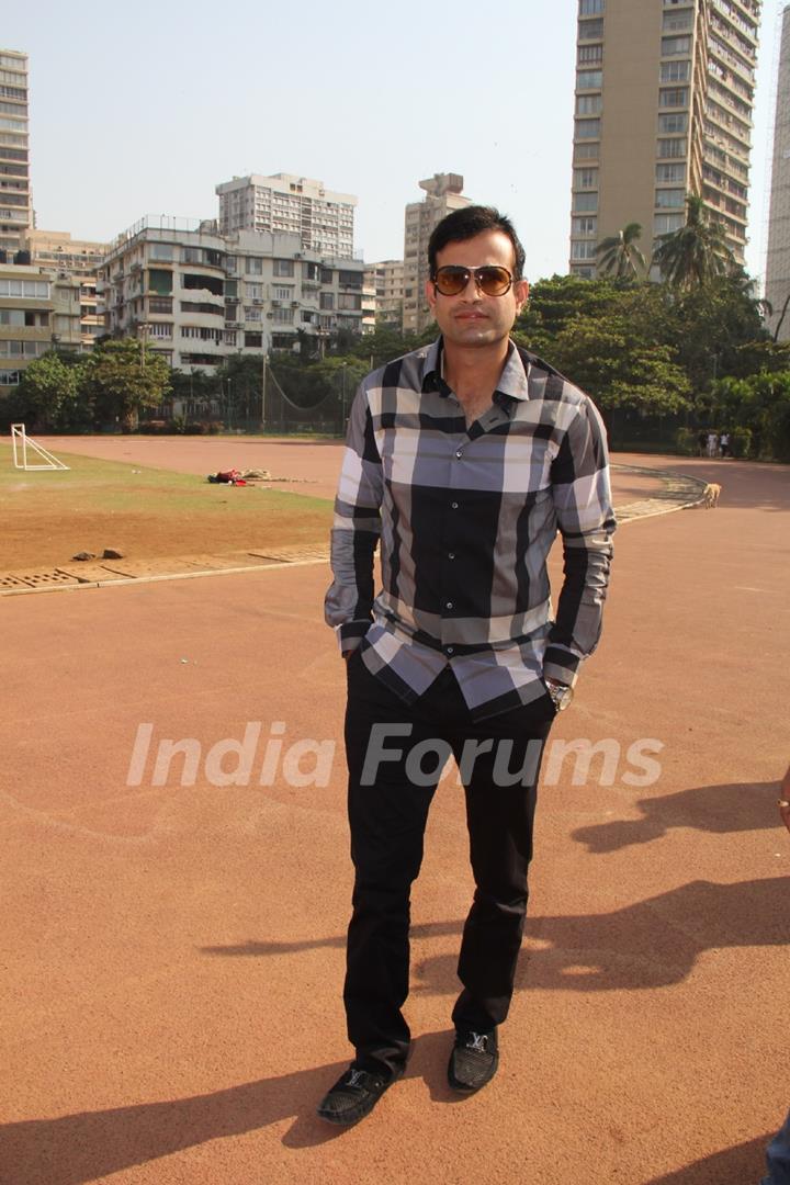 Irfan Pathan poses for the media at Bright Start Fellowship International School
