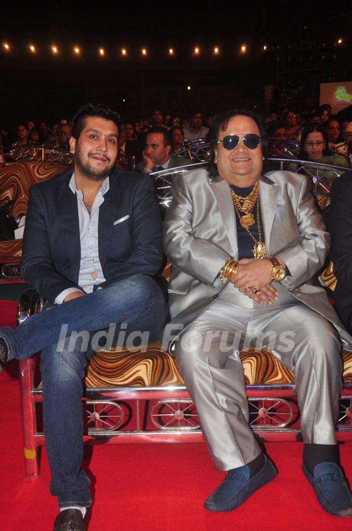 Bappi Lahiri and Bappa Lahiri smile for the camera at Umang Police Show