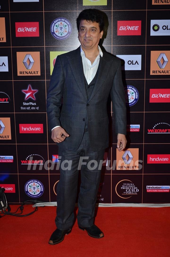 Sajid Nadiadwala poses for the media at Star Guild Awards