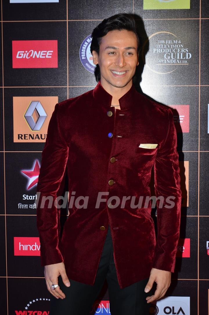 Tiger Shroff poses for the media at Star Guild Awards