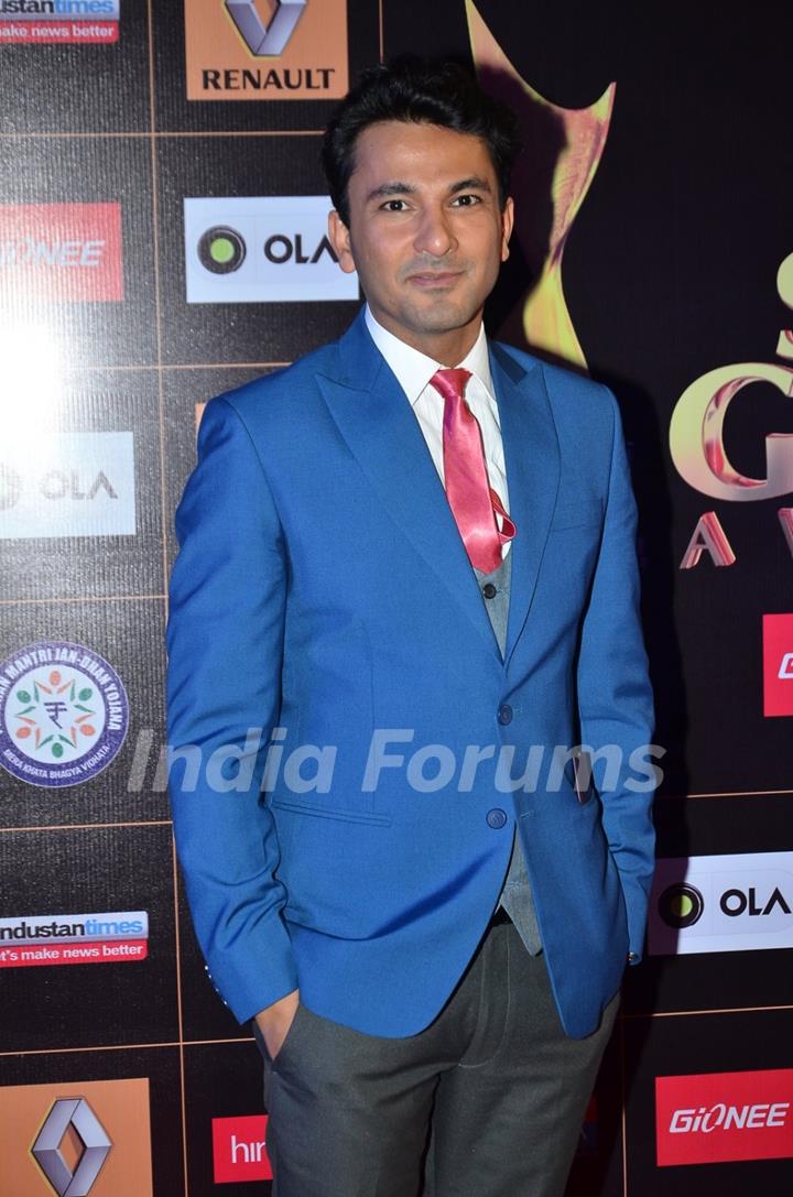 Vikas Khanna poses for the media at Star Guild Awards