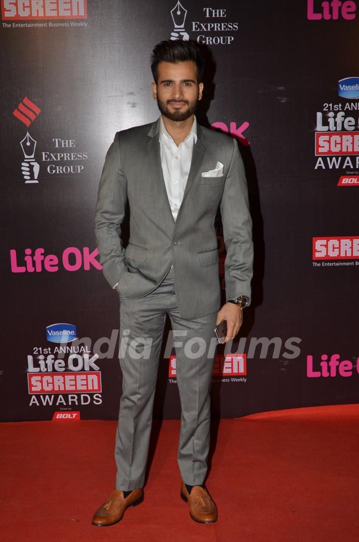 Karan Tacker poses for the media at 21st Annual Life OK Screen Awards Red Carpet