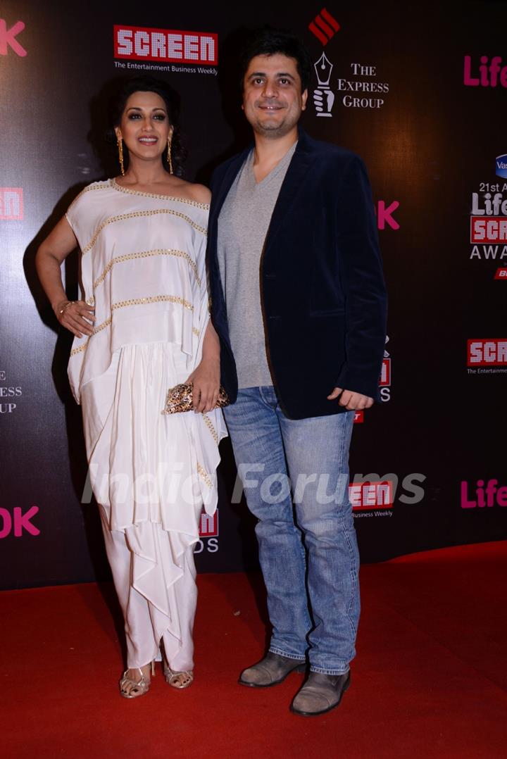 Goldie Behl and Sonali Bendre pose for the media at 21st Annual Life OK Screen Awards Red Carpet