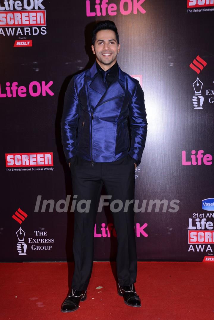 Varun Dhawan poses for the media at 21st Annual Life OK Screen Awards Red Carpet