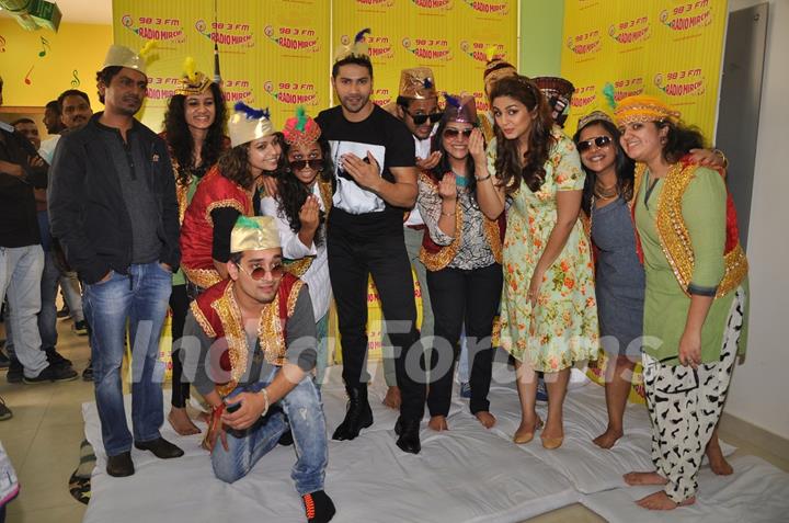 Team of Badlapur poses with the members of Radio Mirchi