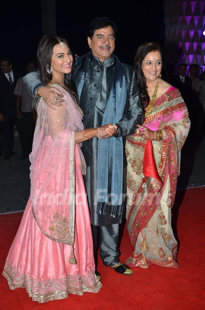 Shatrughan Sinha poses with wife Poonam Sinha and daughter Sonakshi Sinha at the Wedding Reception