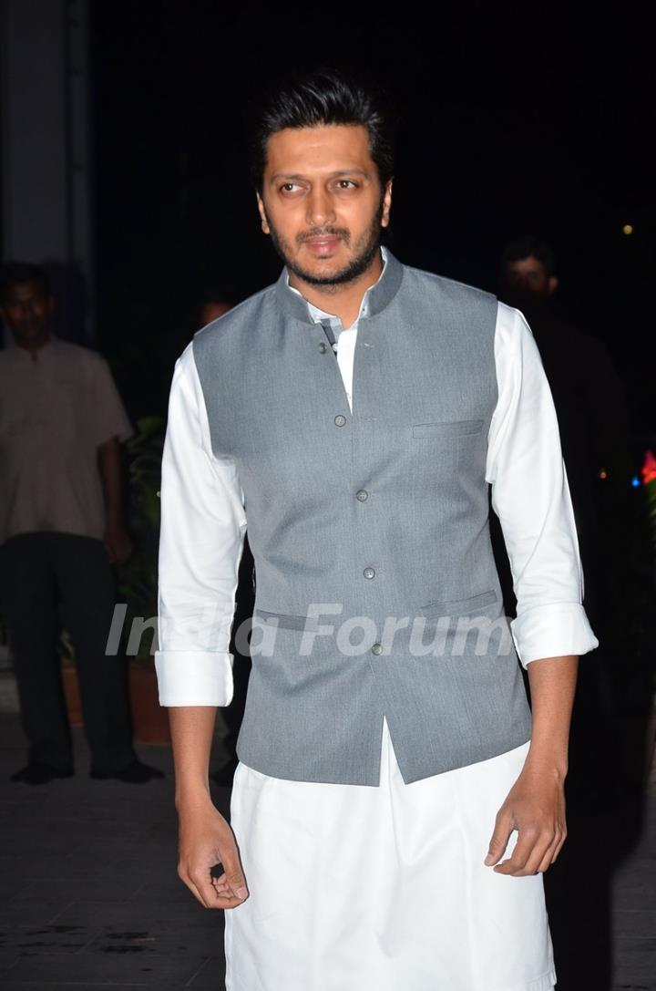 Riteish Deshmukh poses for the media at Kush Sinha's Wedding Reception