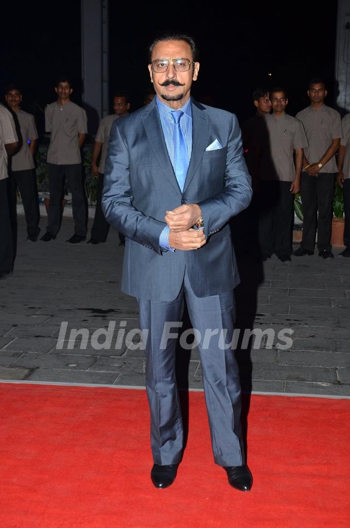 Gulshan Grover poses for the media at Kush Sinha's Wedding Reception