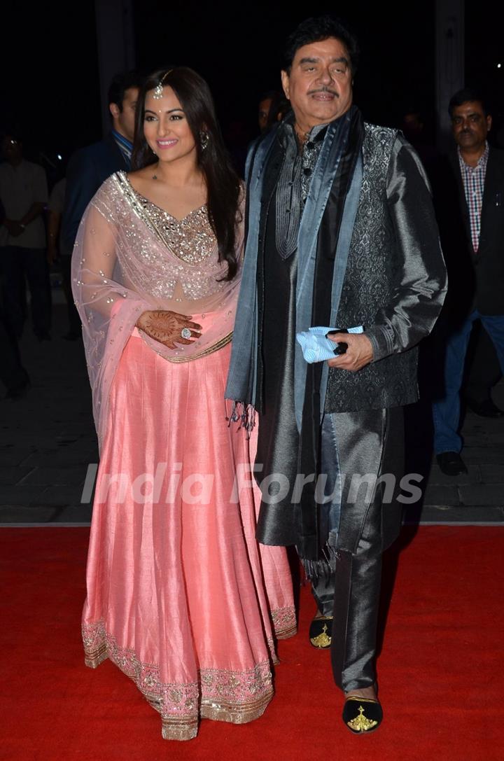 Shatrughan Sinha poses with daughter Sonakshi Sinha at the Wedding Reception of Son Kush Sinha