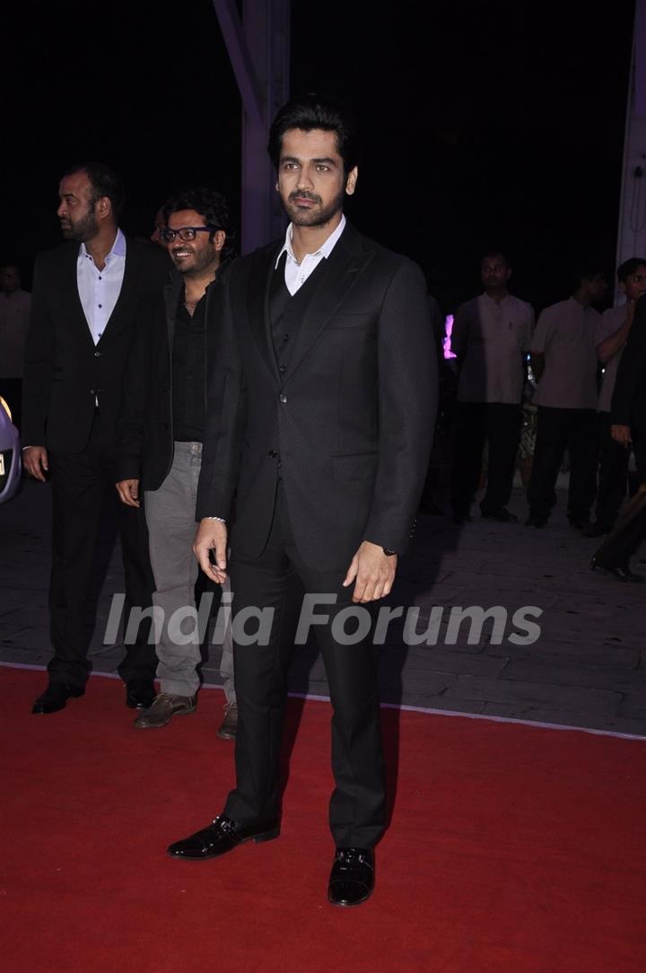 Arjan Bajwa poses for the media at Kush Sinha's Wedding Reception