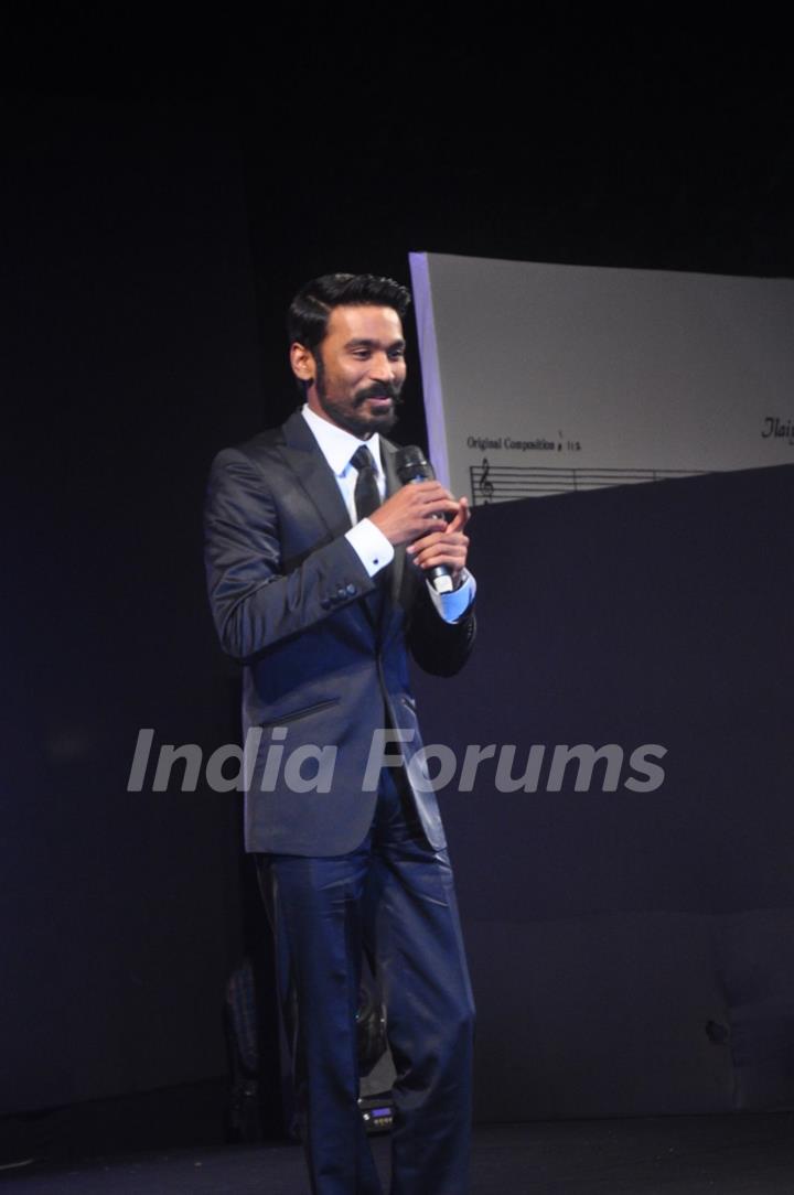 Dhanush interacts with the audience at the Music Launch of Shamitabh