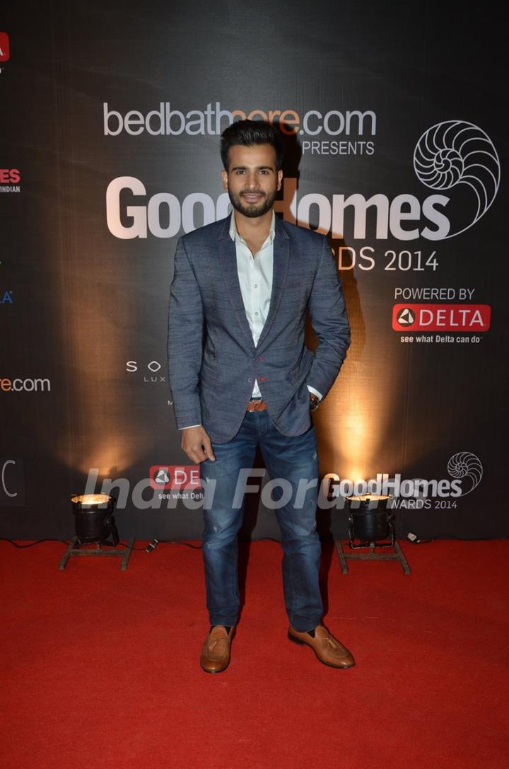 Karan Tacker poses for the media at GoodHomes Awards 2014