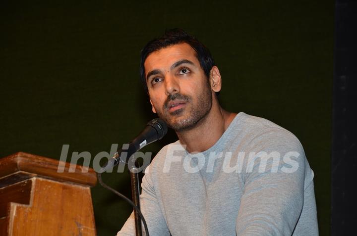 John Abraham interacts with the audience at the Launch of the Book In Search Of Dignity And Justice