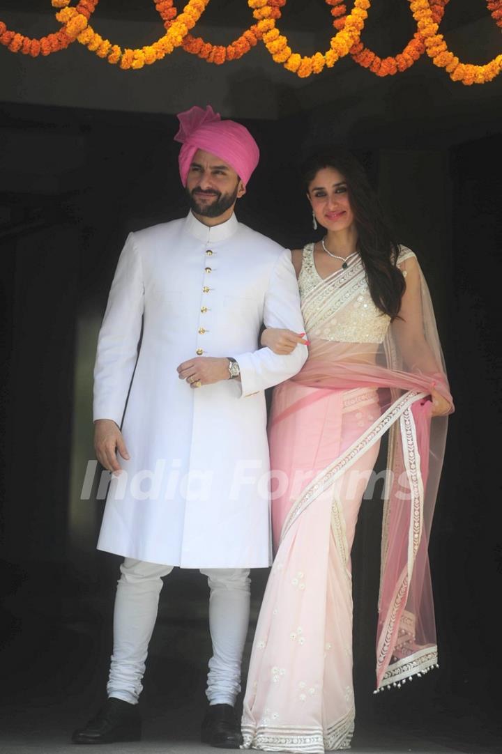 Saif Ali Khan and Kareena Kapoor pose for the media at Soha Ali Khan and Kunal Khemu's Wedding