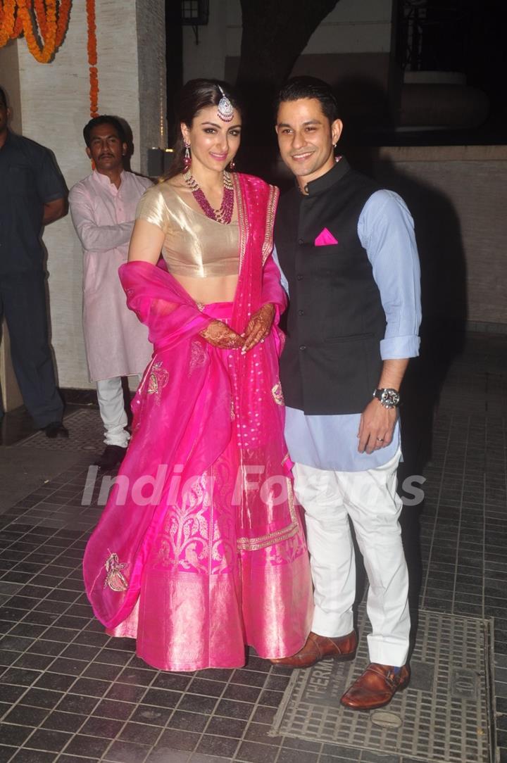 Soha Ali Khan and Kunal Khemu pose for the media at their Wedding Reception