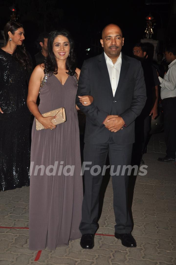 Sonali Kulkarni with her husband on the 60th Britannia Filmfare Awards