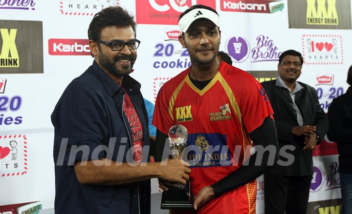 Daggubati Venkatesh gives an award at CCL Match Between Mumbai Heroes and Telugu Warriors