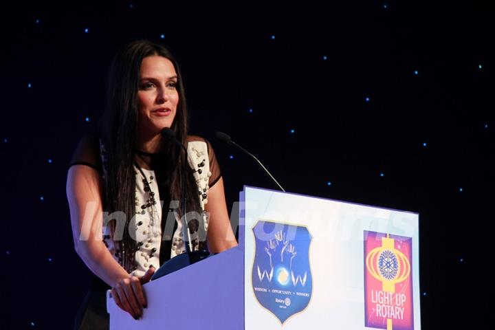 Neha Dhupia addressing the audience at Discon District Conference