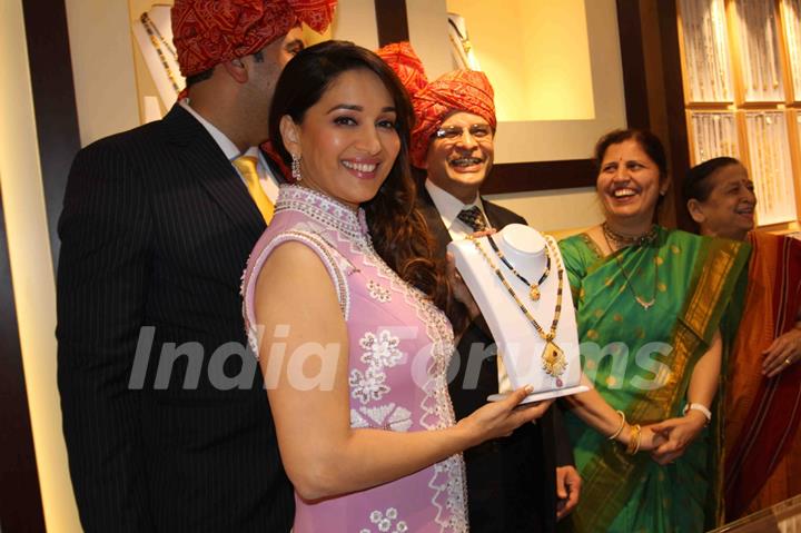 Madhuri Dixit Nene poses for the media at  P.N. Gadgil Jewellers' New Showroom