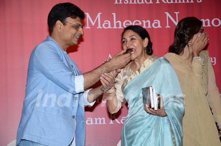 Irshad Kamil was snapped feeding a piece of cake to Deepti Naval at the Book Launch