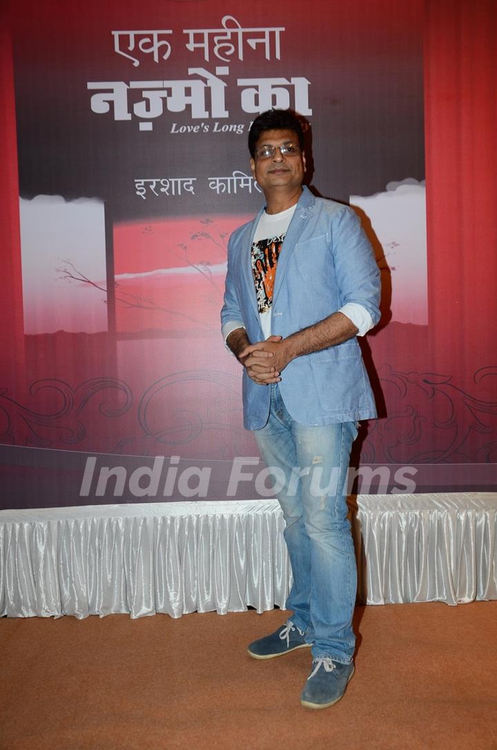 Irshad Kamil poses for the media at his Book Launch