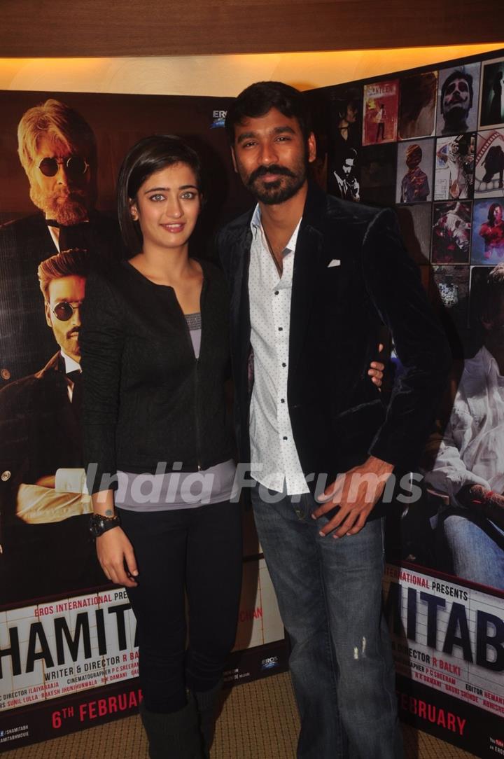 Dhanush and Akshara Haasan pose for the media at the Promotions of Shamitabh