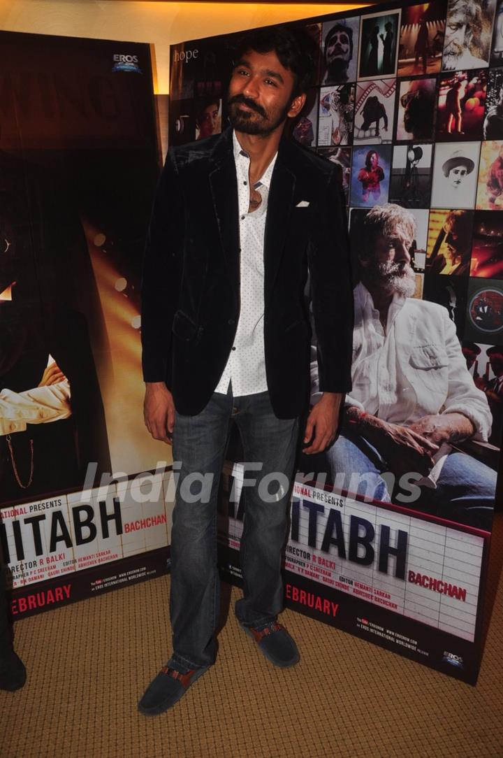 Dhanush poses for the media at the Promotions of Shamitabh